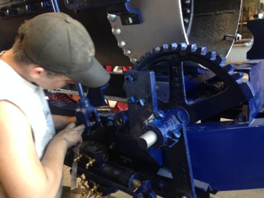 Nicholas installing the pump rod